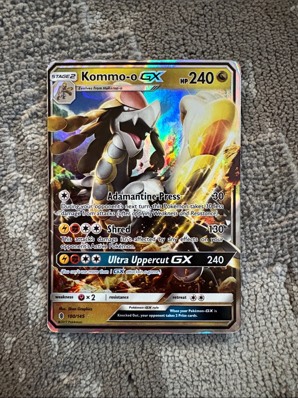 Kommo-o-GX Holographic Trading Card – Gold/Brown